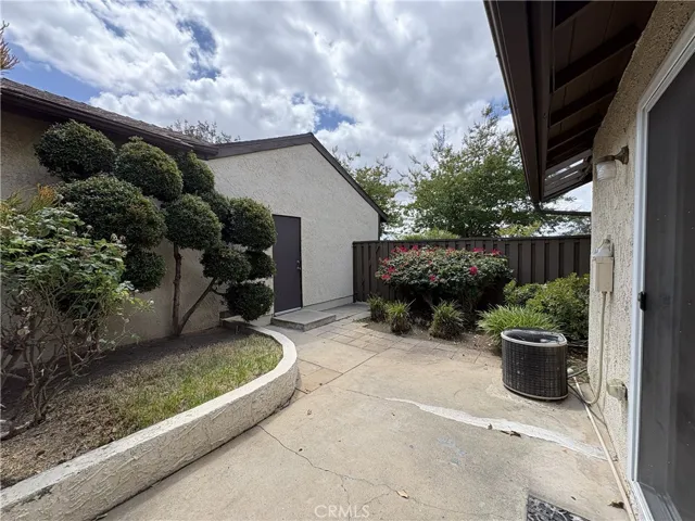 Patio with mandoor to garage