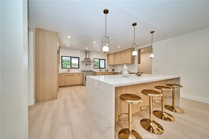 CHEF'S KITCHEN WITH OVERSIZED ISLAND