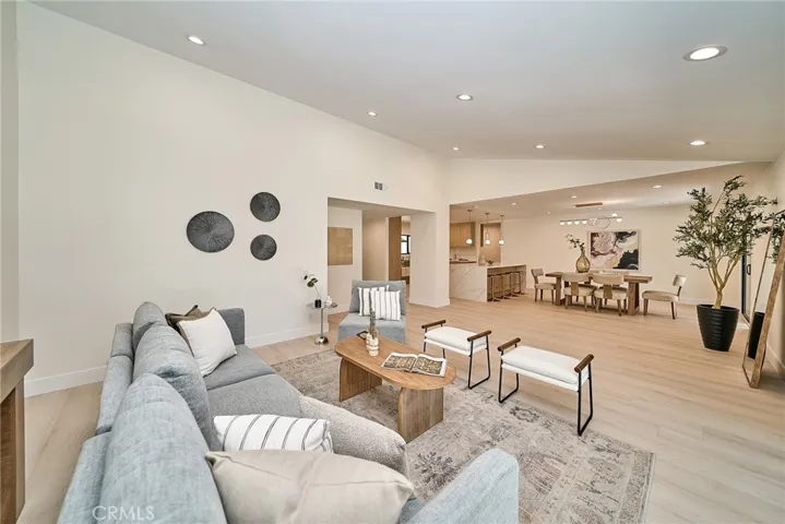 SPACIOUS OPEN LIVING ROOM WITH DIRECT ACCESS TO THE BACKYARD