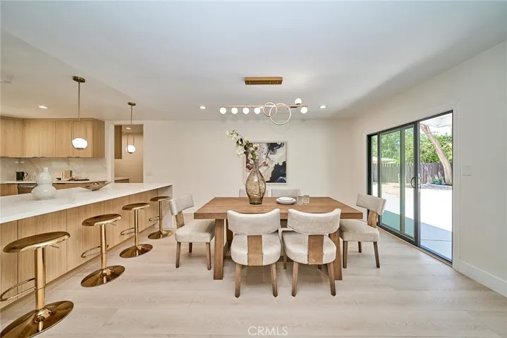 DINING AREA WITH BACKYARD ACCESS