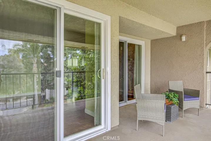 The ample patio is a perfect place for dining or relaxing.  Plenty of room for a  dining table and sofa seating area.