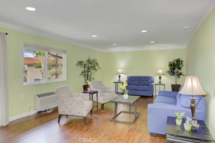 Laminate floors, smooth ceilings, recessed lighting, crown molding and dual pane windows have been added to give this condo a luxurious feeling.