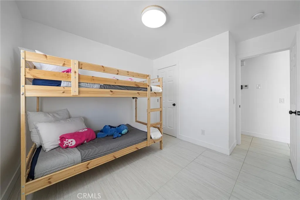 This bedroom is located right before entering into the living room. Double pane window has a view of the backyard.