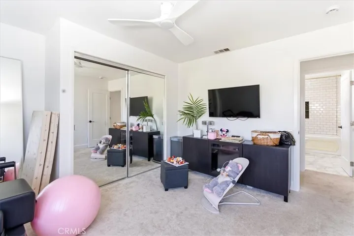 Same family/playroom as Slot 23 from a different angle, emphasizing open space and light.