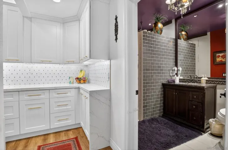 Modern bathroom with step in shower.
