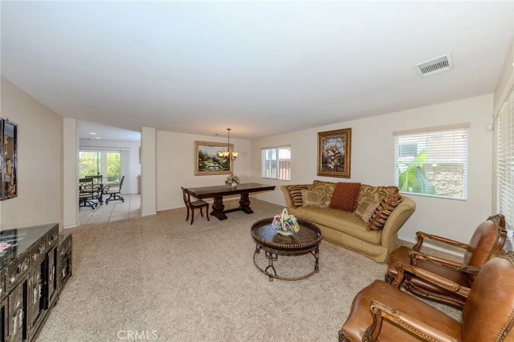 A few steps in from the front door overlooking livingroom and dining area