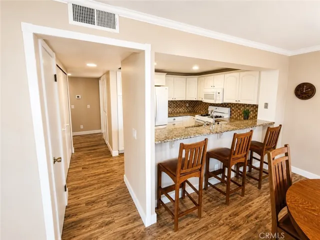Hallway to Kitchen, Bedrooms and Bath