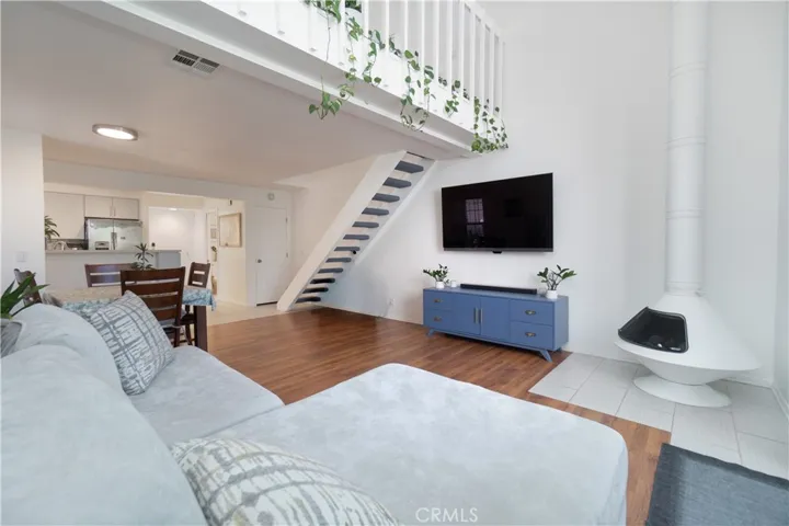 Open living room and vaulted ceilings up to the loft area