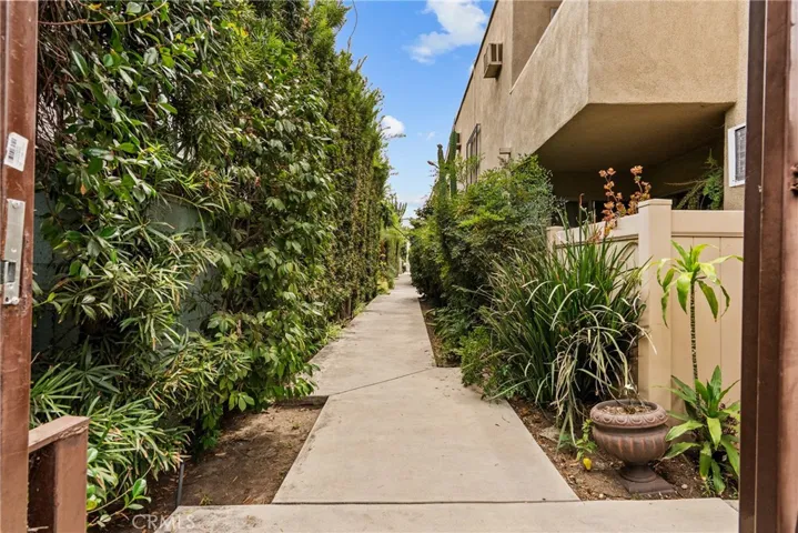 Open walkway leading to unit
