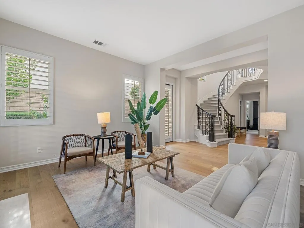 wonderful living room/piano sitting room with new wide plank oak floor