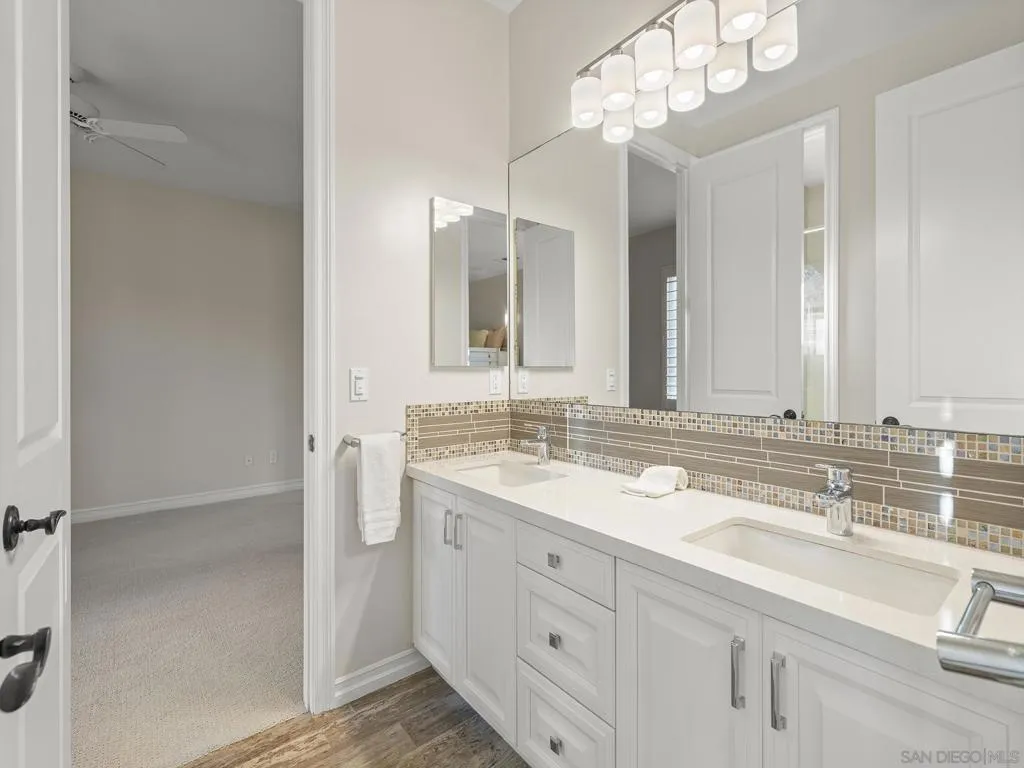 Jack and Jill bathroom is nicely remodeled