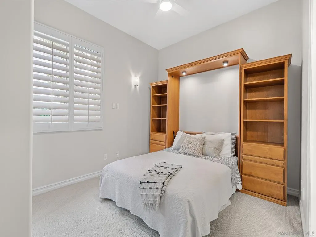 Awesome main level ensuite  bedroom with a nice murphy bed set up
