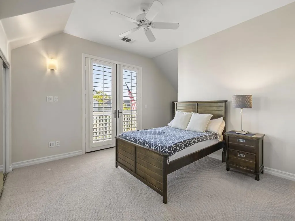 This ensuite bedroom suite has a small balcony and a direct access stair case up to its entrance.