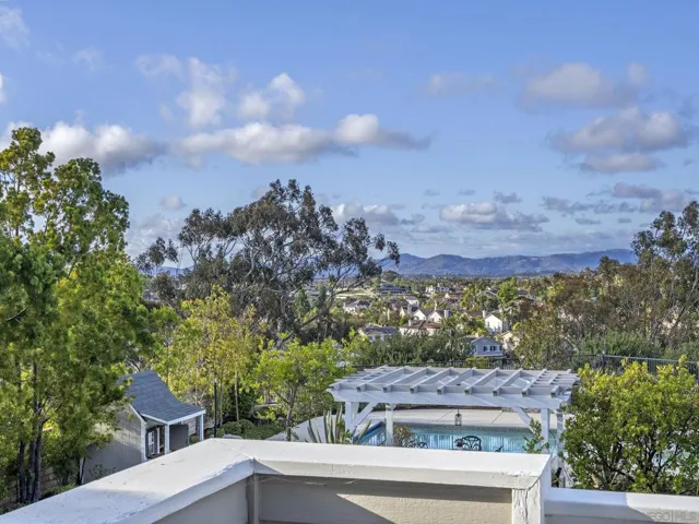 Wonderful view of your park like yard and the mountains beyond from your primary balcony.