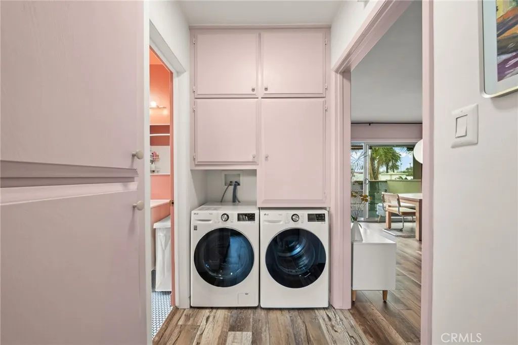 Hallway w/ laundry and storage