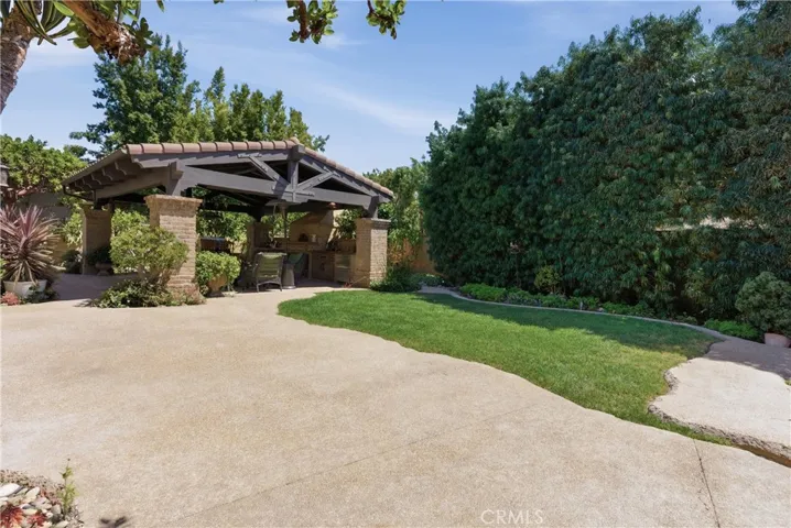 Generous outdoor entertaining space offering multiple seating and gathering areas