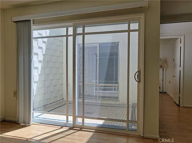 Enclosed atrium off the dining room area.