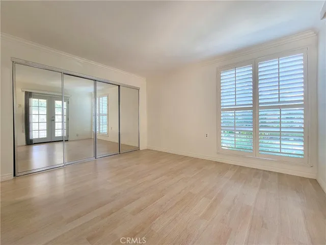 Mirrored wardrobe doors.