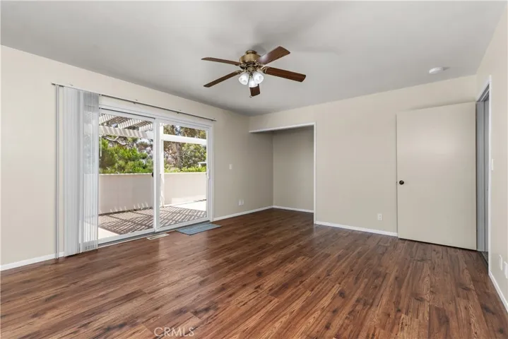 Primary bedroom opens up to balcony