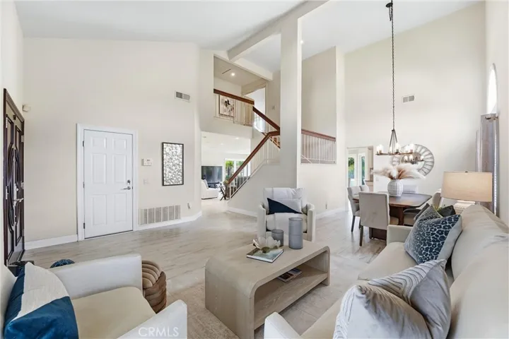 Living room, the door will take you to the garage.