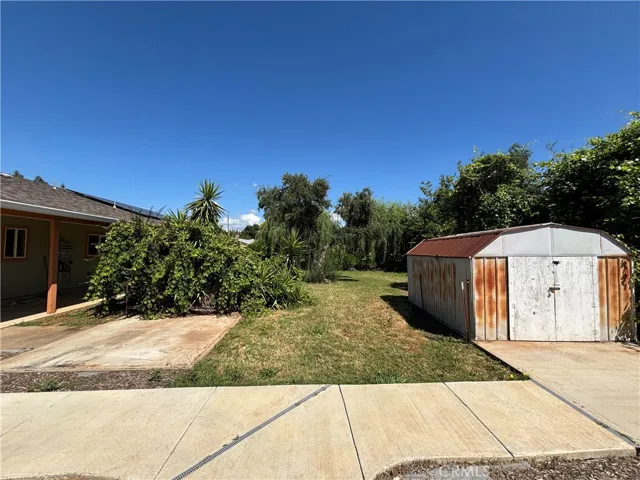 Concrete paths in back yard nice sized shed