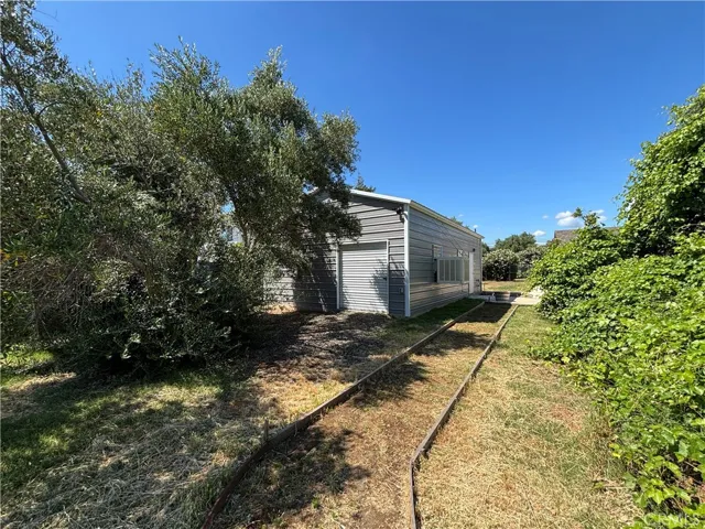 View of back of shop and forms for sidewalk