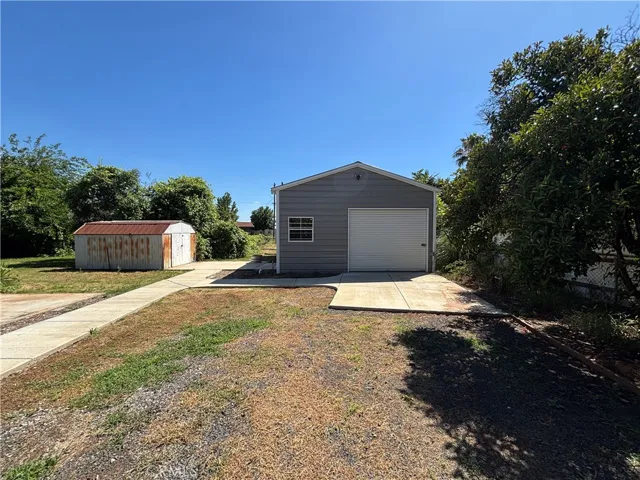 View of shop, shed and space for RV, toys, work projects