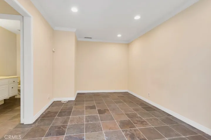 Original-unstaged, down stairs flexible room.