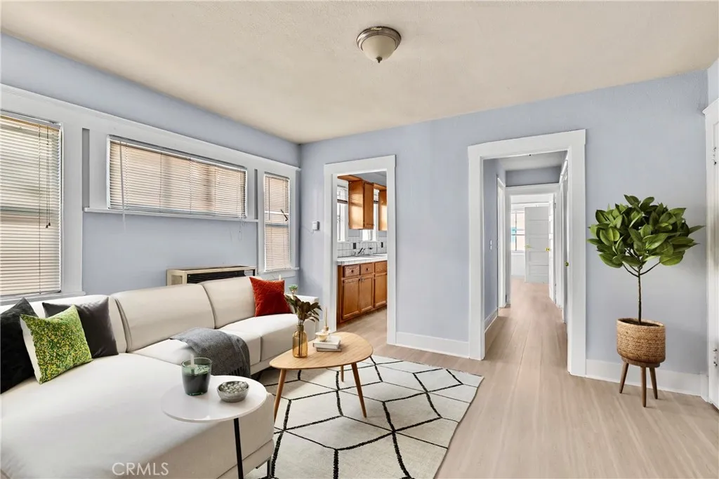 AI altered version of living room in upstairs unit.