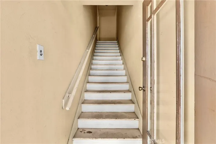 One of the stairways up to the upstairs unit, ready for flooring.