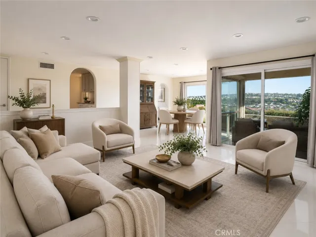 Open and airy floor plan with beautiful views. Digitally enhanced and virtually staged furniture.
