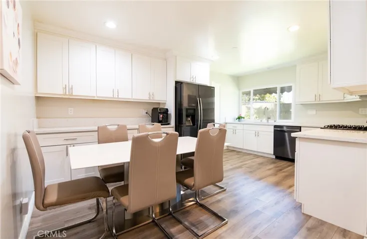 Bright kitchen and dining area.  Adjacent to living room.