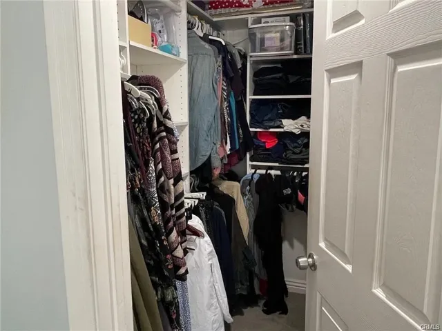 Walking closet in master bedroom