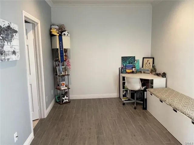 Den or office is pave with tile  for easy movements