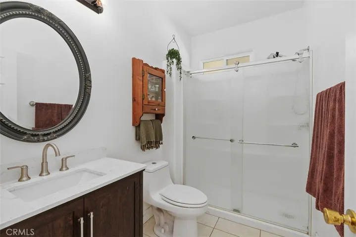 Guest bathroom across from the third bedroom.