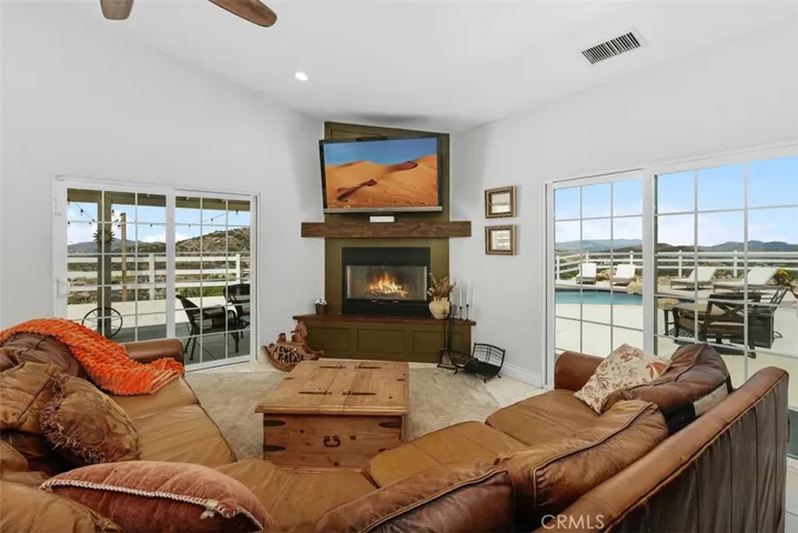 The pool is waiting just outside the family room!