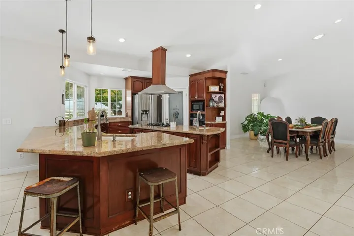 Counter seating plus a dining table area.
