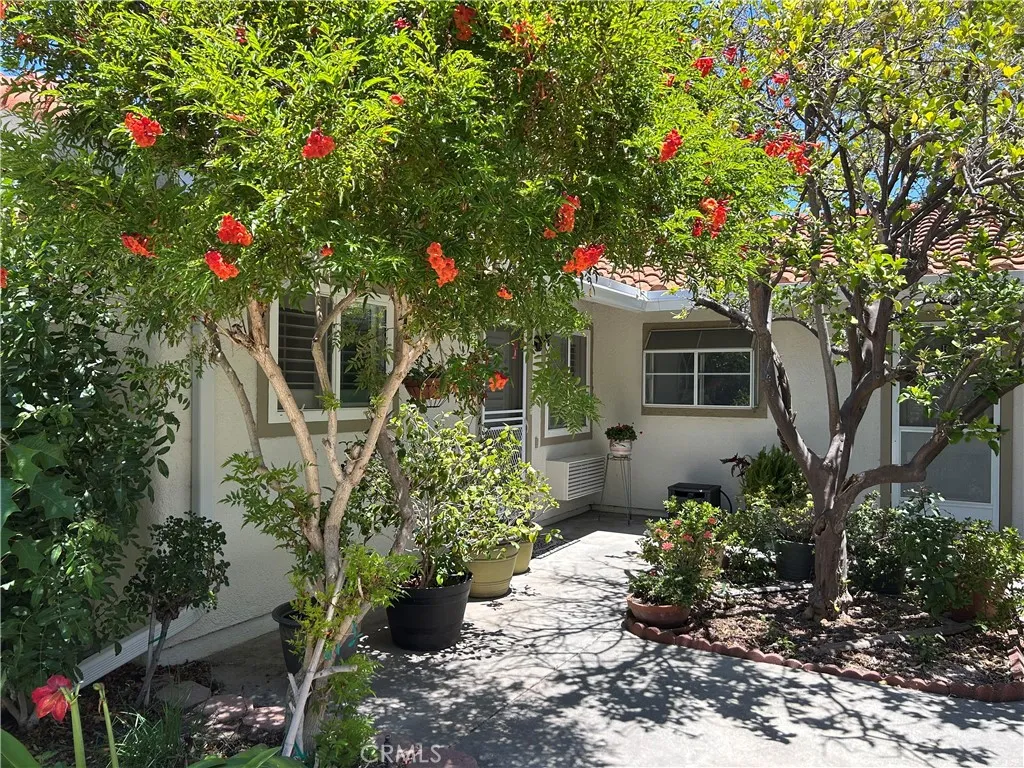 Shared courtyard entry in a lovely garden setting