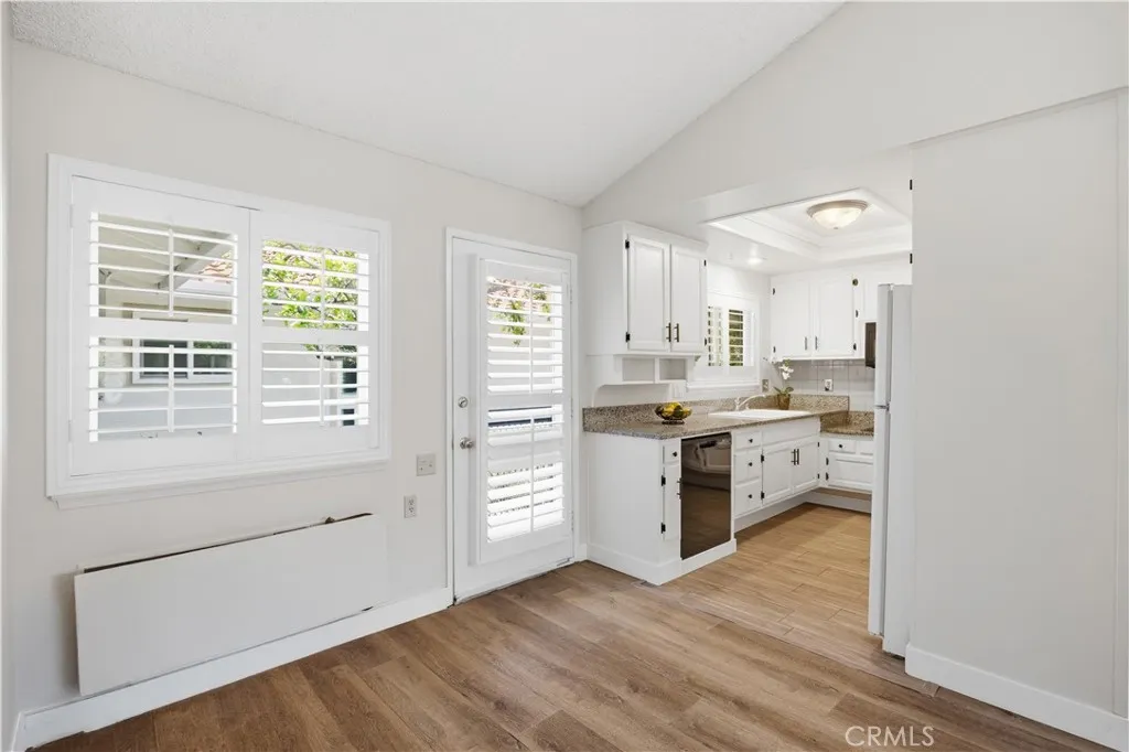 Courtyard door invites refreshing cross breezes