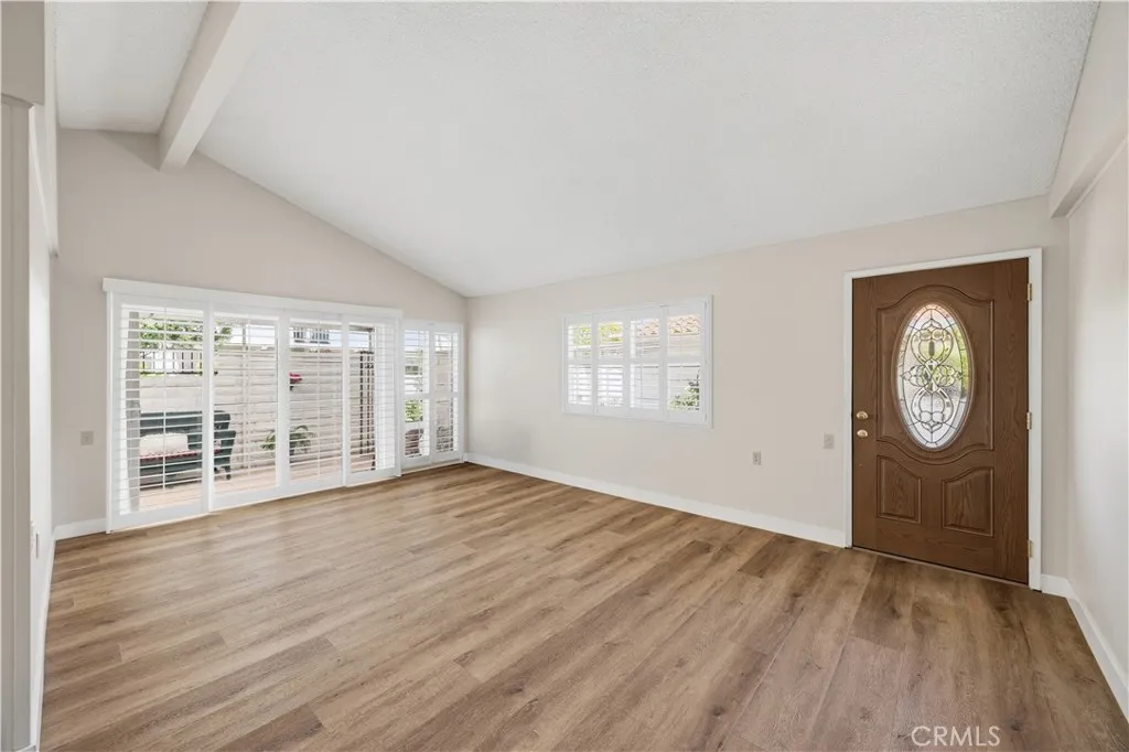 Bright living room with fresh paint and shutters