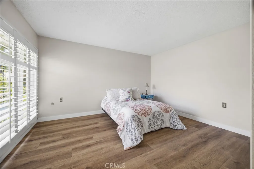 Primary bedroom with plantation shutters