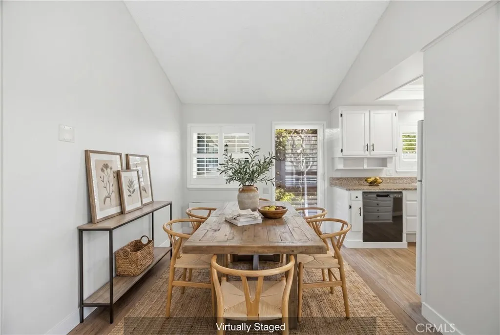 Courtyard-view dining area, virtually staged