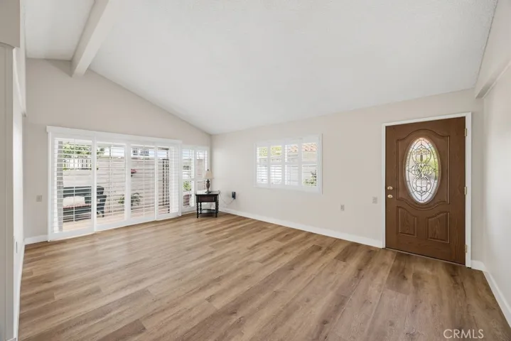 Bright living room with fresh paint and shutters