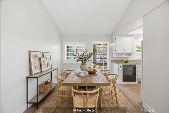Courtyard-view dining area, virtually staged