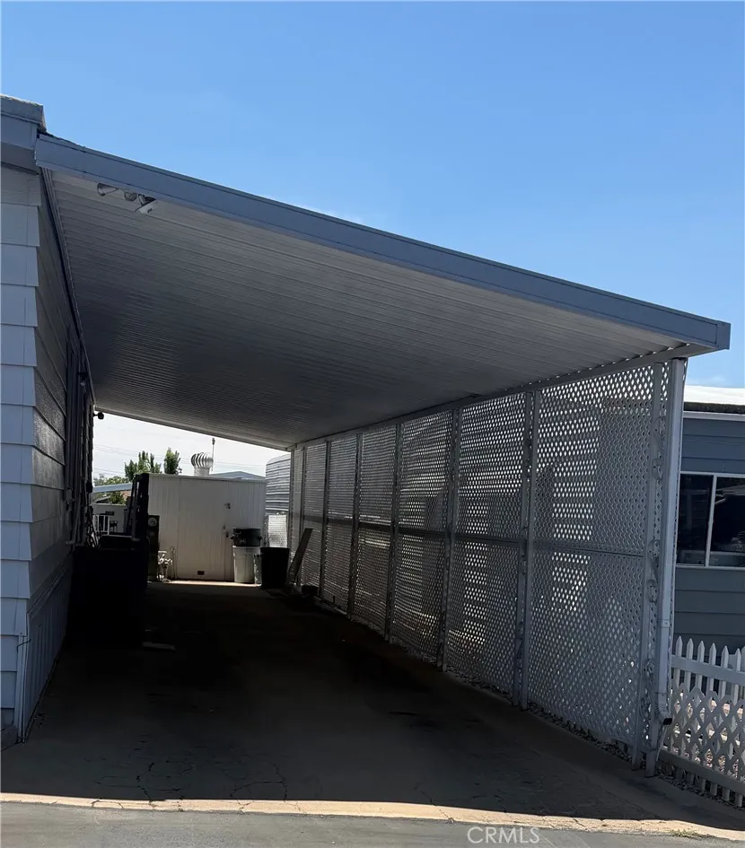 Carport with ramp and 2nd Shed