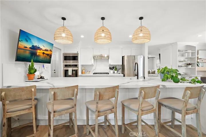 Beautiful quartz kitchen with long breakfast bar