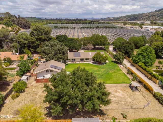 Back aerial  view of property