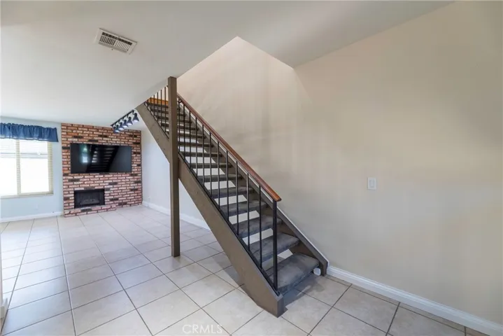 Contemporary stairs heading to the bedrooms upstairs.