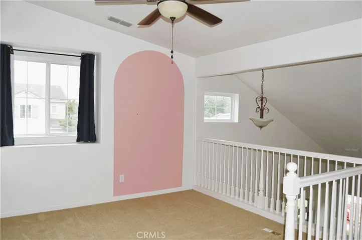 Upstairs loft area / home office, hobbies, could be converted into a 4th Bedroom