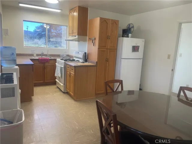 dining room area in the enclosed kitchen